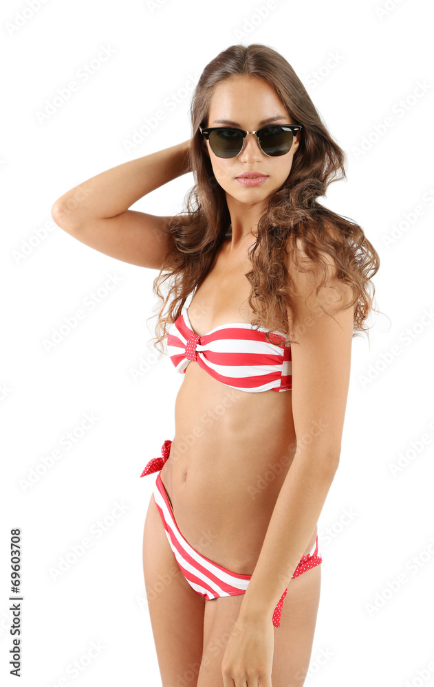 Beautiful young woman in striped swimsuit isolated on white Beautiful young woman in striped swimsuit isolated on white
