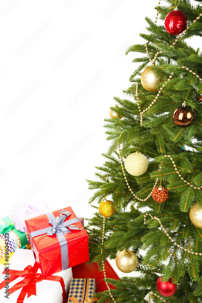 Decorated Christmas tree with gifts isolated on white Decorated Christmas tree with gifts isolated on white
