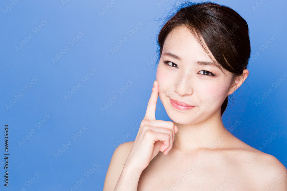 beautiful asian woman on blue background beautiful asian woman on blue background