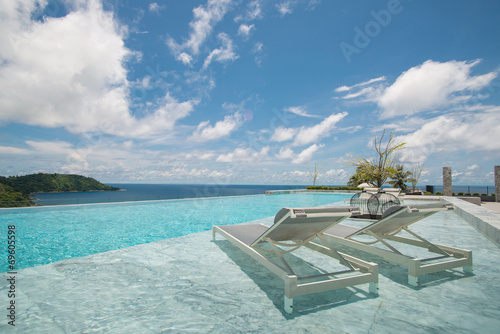 Infinity swimming pool with a view on Phuket Sea © Delicious
