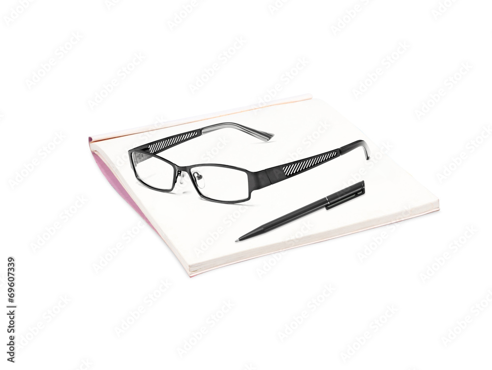 book with glasses and pen isolated on white background book with glasses and pen isolated on white background