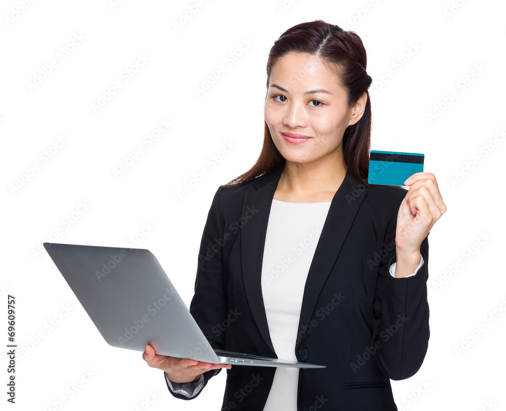 Asian businesswoman with laptop credit card Asian businesswoman with laptop credit card