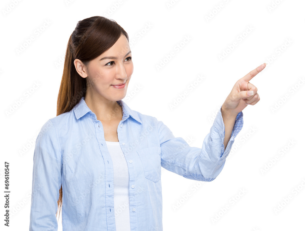 Asian woman touch on imaginary panel Asian woman touch on imaginary panel