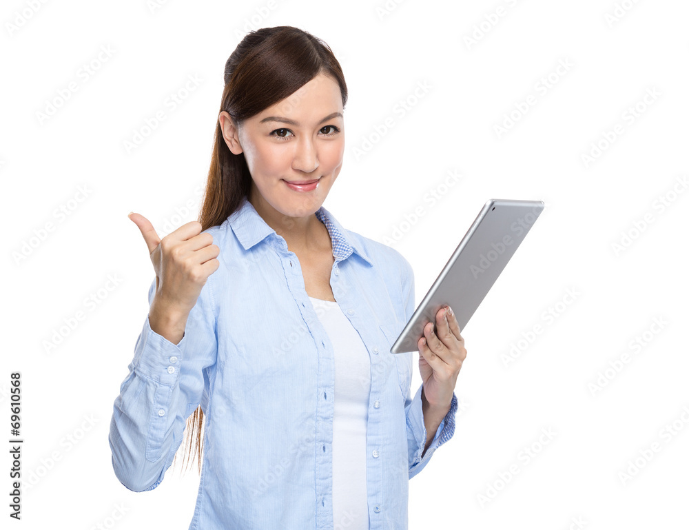 Asian woman hold digital tablet with thumb up Asian woman hold digital tablet with thumb up