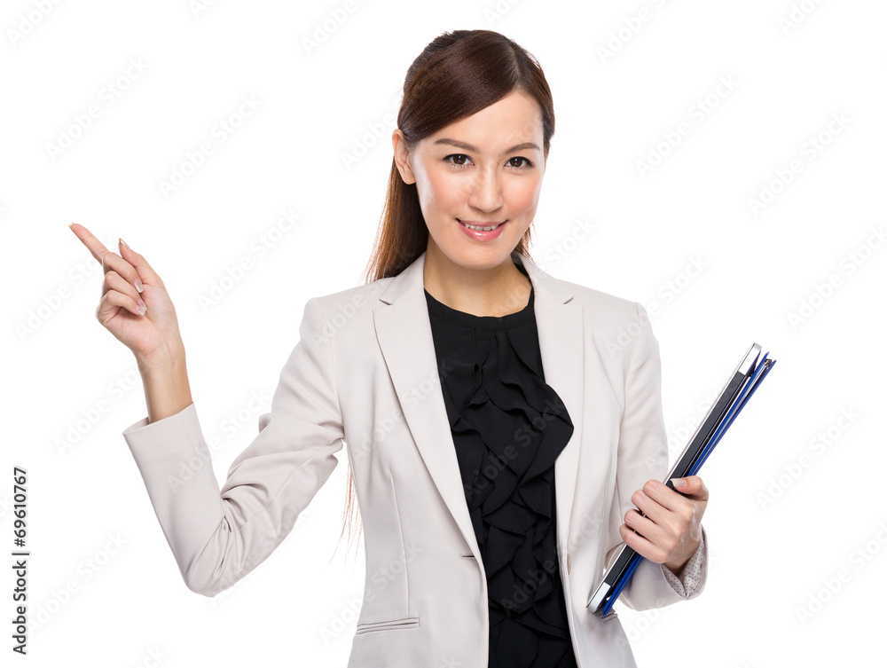 Businesswoman hold with clipboard and finger point aside Businesswoman hold with clipboard and finger point aside