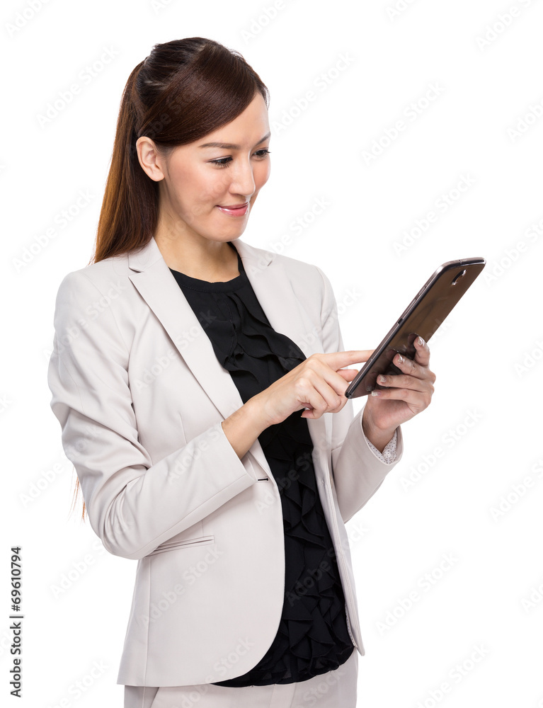 Businesswoman use of digital tablet Businesswoman use of digital tablet