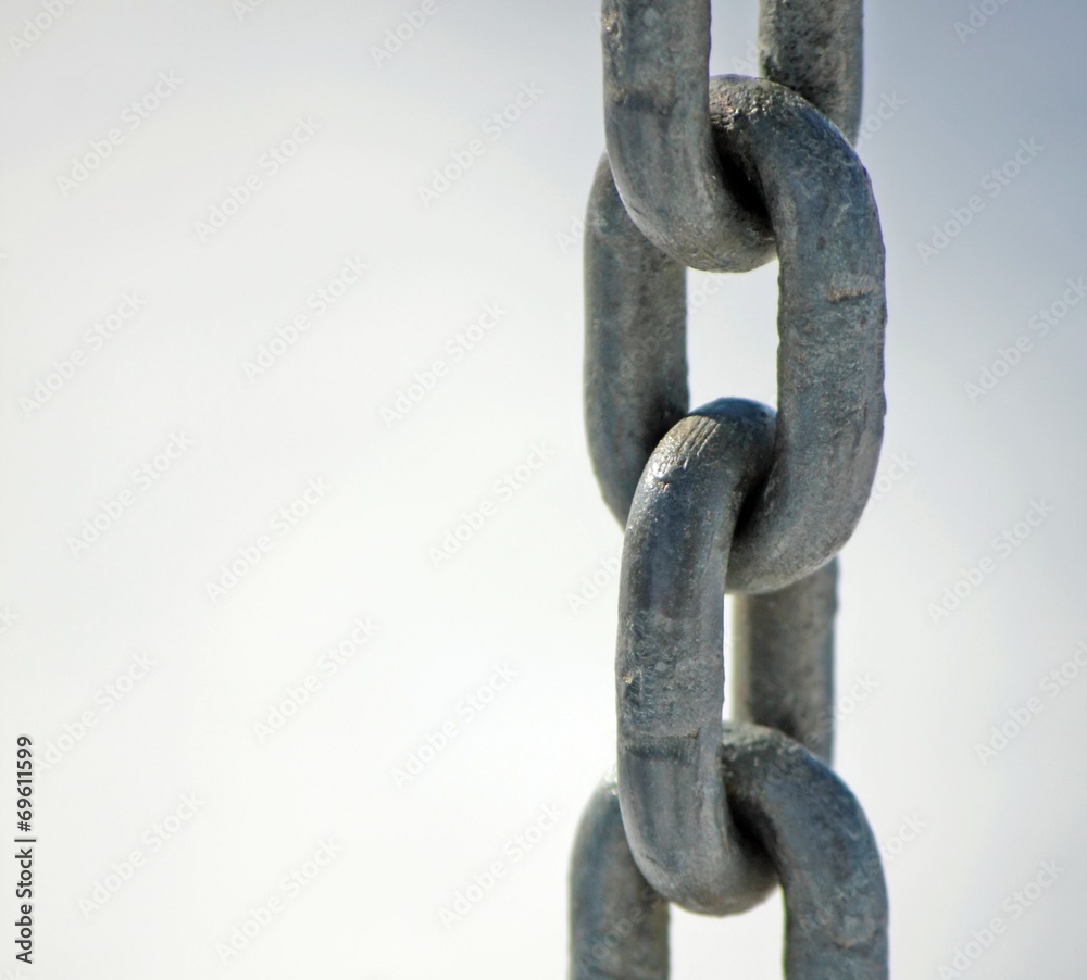 Fototapeta premium steel chain with rings all together vertically
