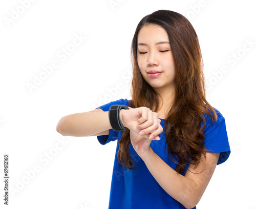 Asian woman with smart watch