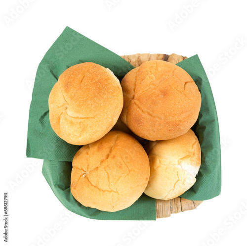 Bulkie rolls on green napkins in a basket photo