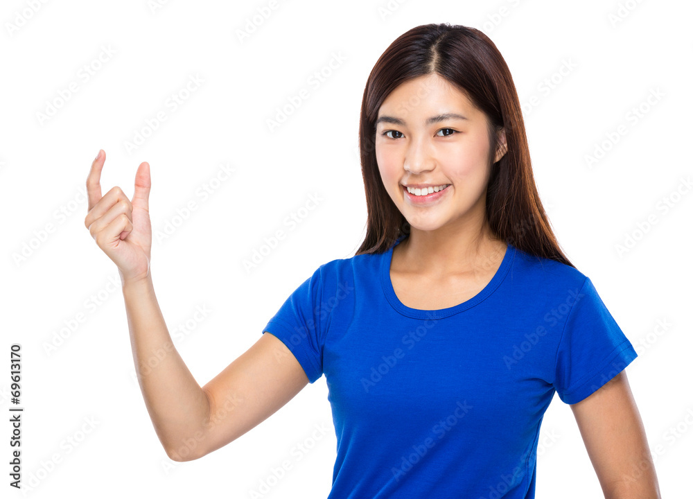 Asian woman with small thing hold on finger Asian woman with small thing hold on finger