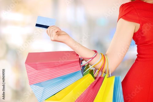 happy woman on shopping with bags, credit cards