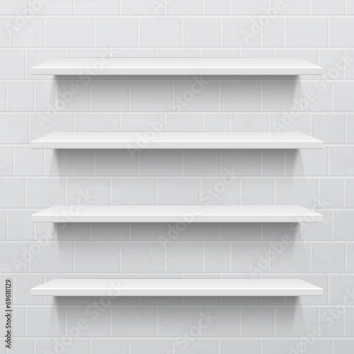 Four white realistic shelves against brick wall