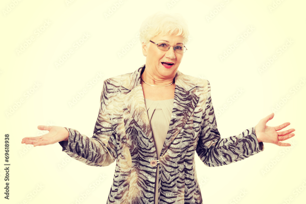 An old elegant lady having her hands spread. An old elegant lady having her hands spread.
