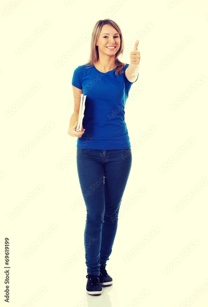 Young beautiful student woman showing OK. Young beautiful student woman showing OK.