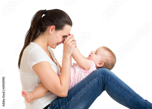 Happy mother playing with h...