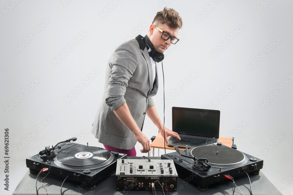 Naklejka premium Dj at work isolated on white background