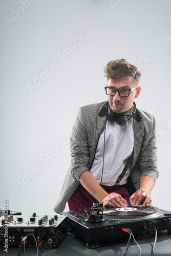 Dj at work isolated on white background