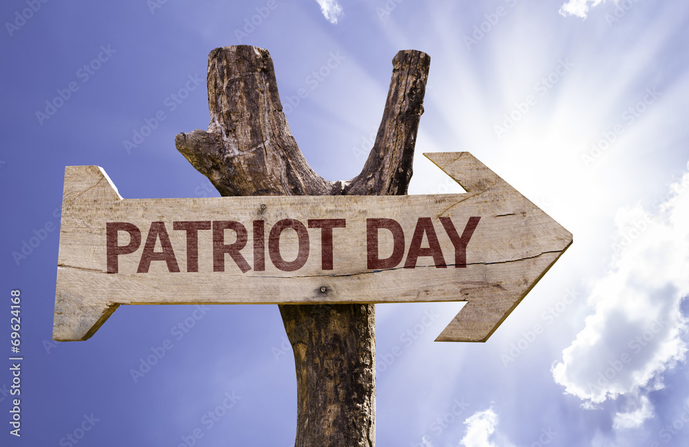 Patriot Day wooden sign on a beautiful day