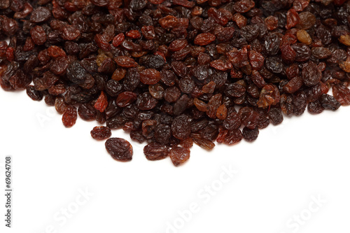 Raisins on white background