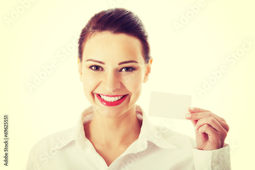 Beautiful business woman holding personal card.