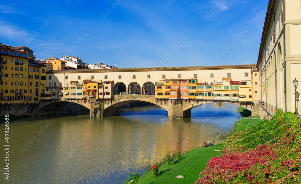 view of Ponte Vecchio over Arno River in Florence, Italy