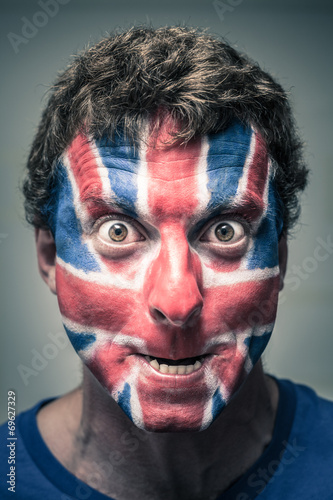 Spooky man with British flag painted on face