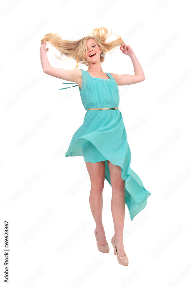 Joyful woman with green dress
