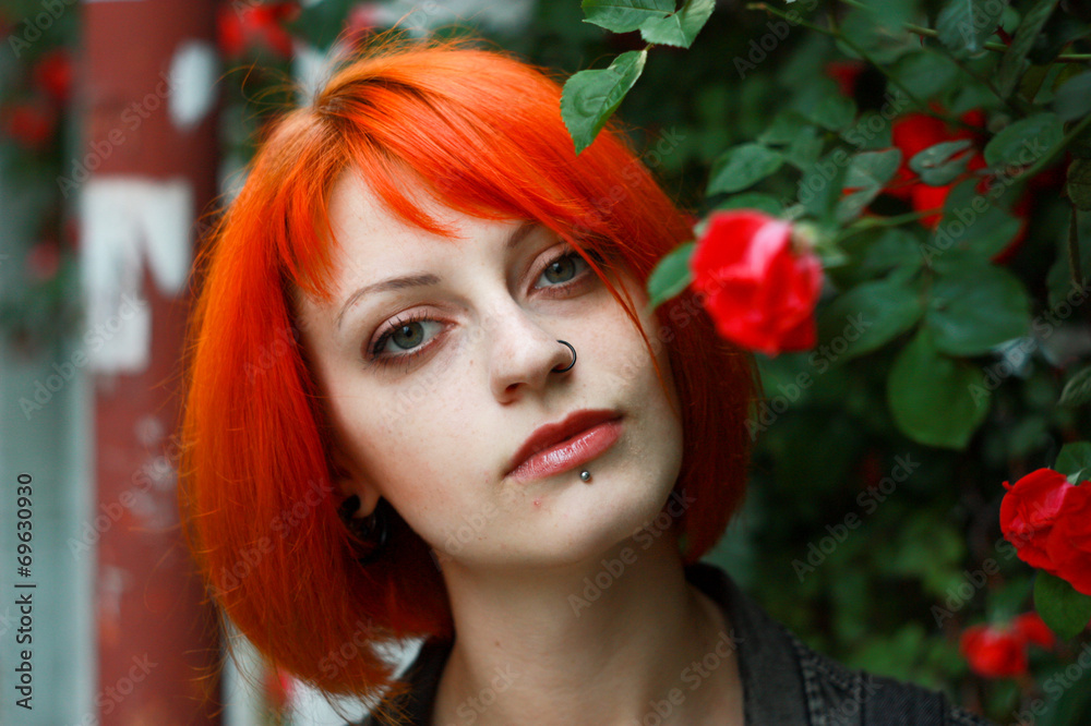 Naklejka premium Red Hair Girl in Rose tree