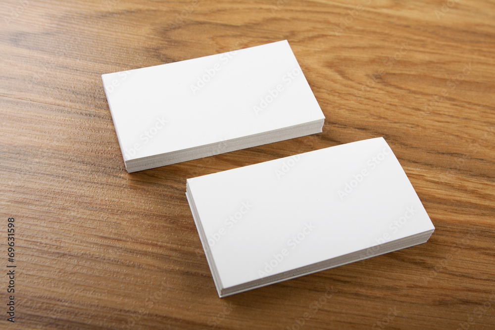 blank business cards on a wooden background blank business cards on a wooden background