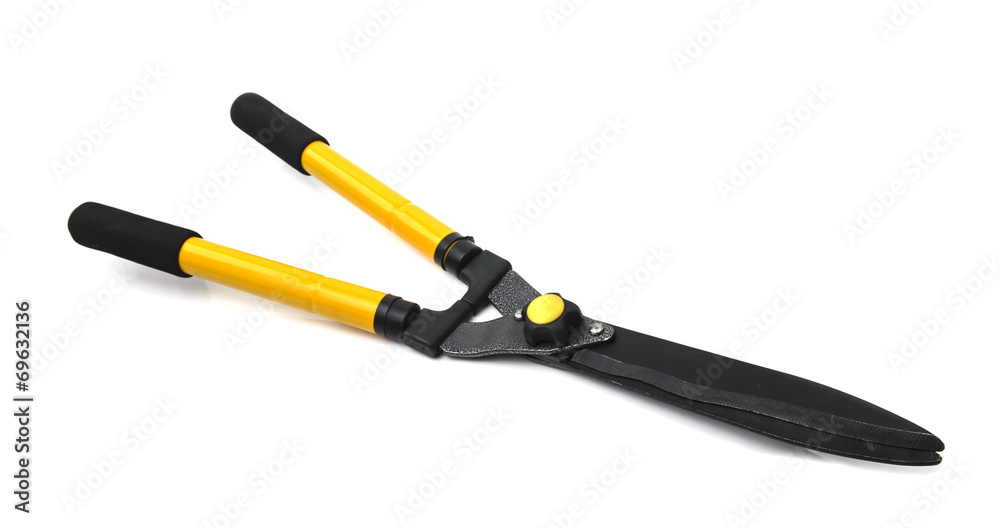 Scissors to cut the grass isolated on white background Scissors to cut the grass isolated on white background