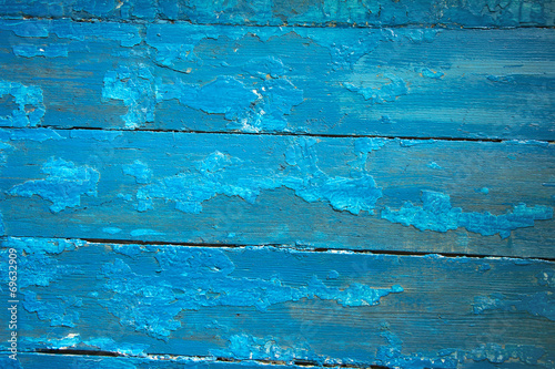 blue wooden planks with peeling paint, texture