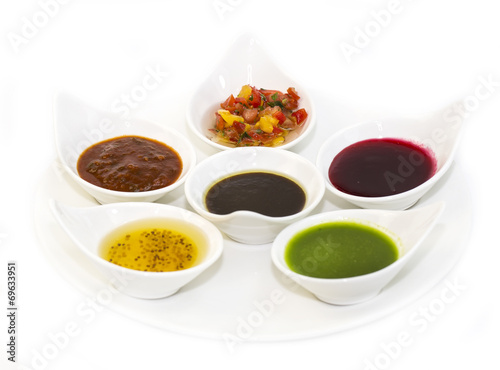 sauces on a white background in the restaurant