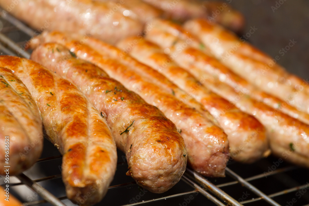 Sausages  on a grill