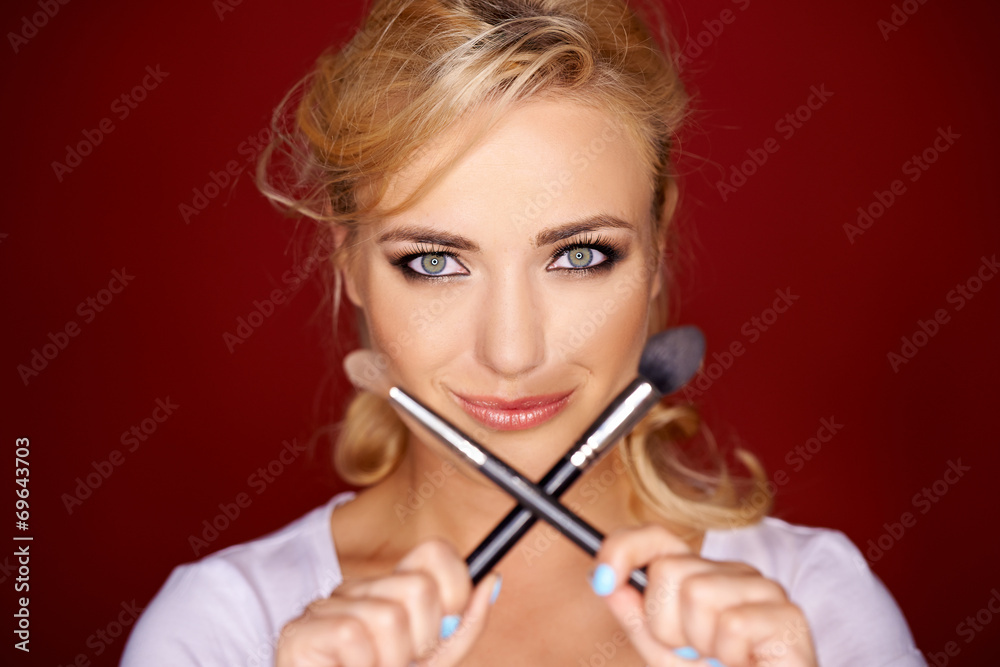 smiling playful blond woman smiling playful blond woman