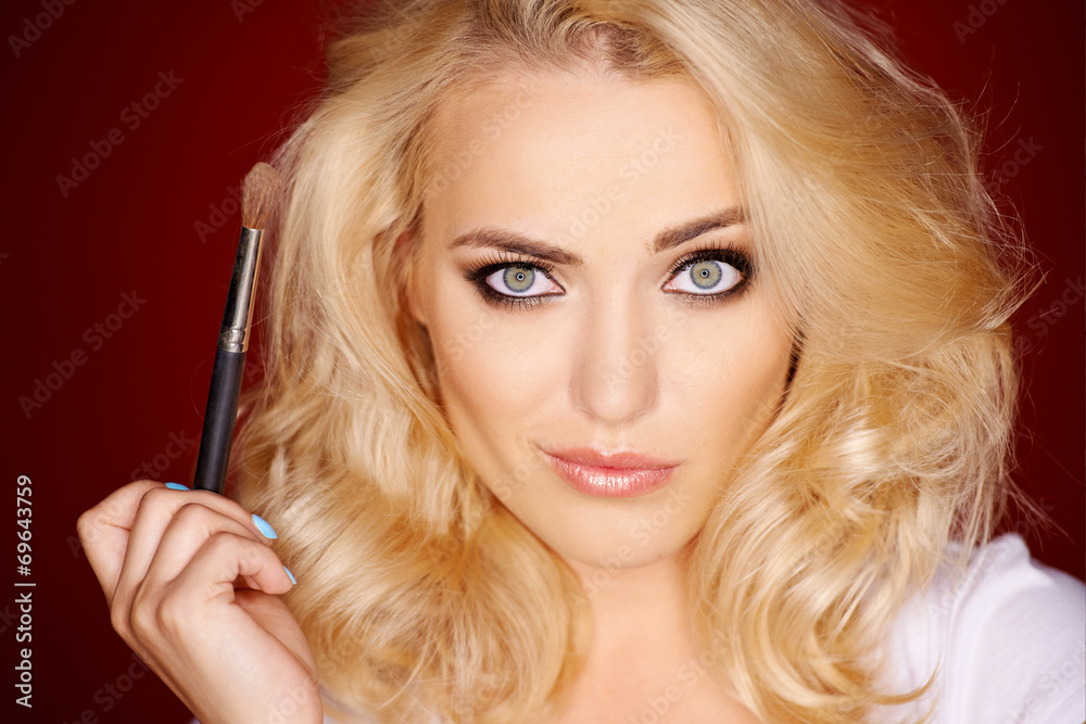 Beautiful blond woman with a quirky expression Beautiful blond woman with a quirky expression