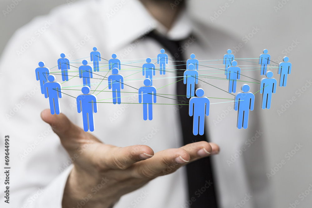 choice - Businessman holding 3D rendering group of blue people choice - Businessman holding 3D rendering group of blue people