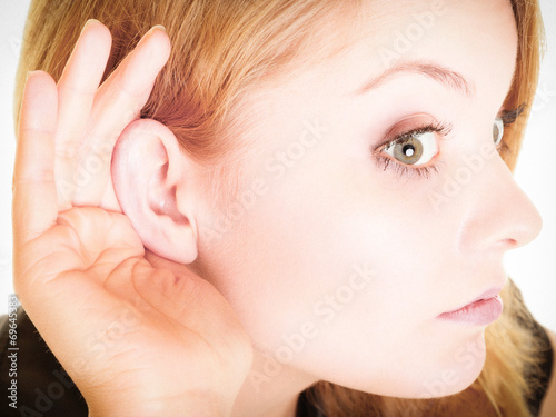 woman blonde buisnesswoman listening on white photo