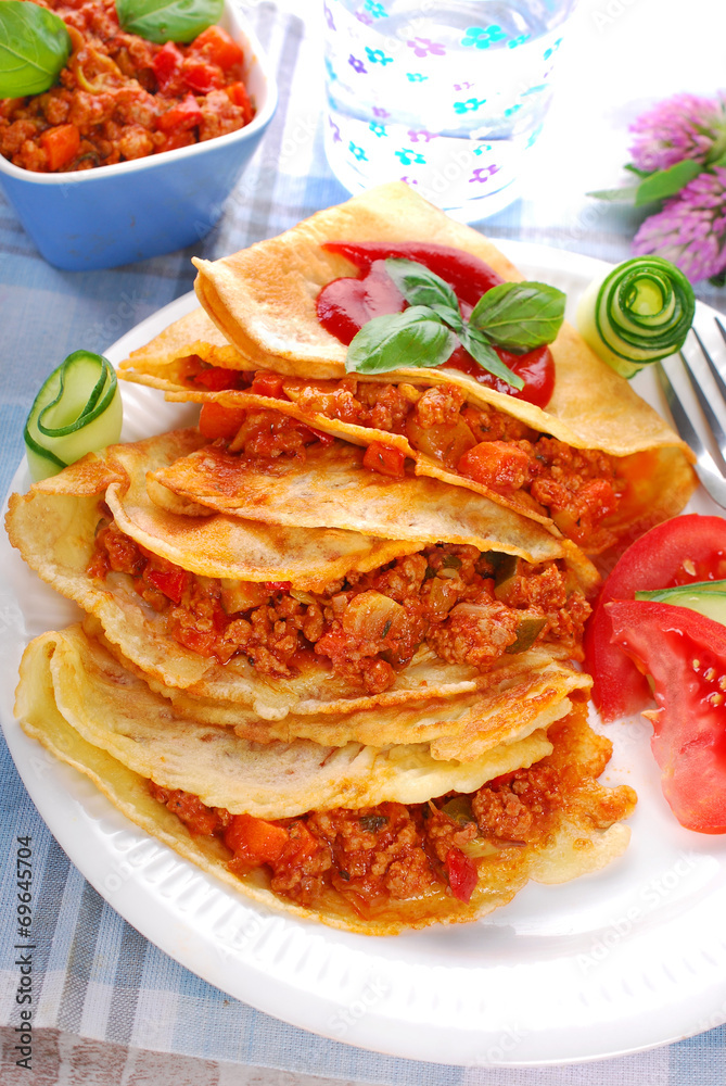 pancakes filled with minced meat and vegetables