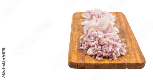 Chopped onions on a chopping board