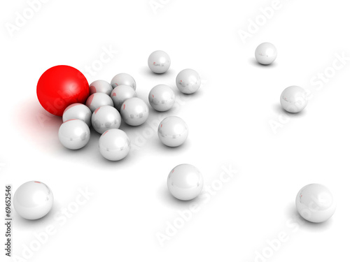 Leadership concept with red sphere and many white ones © VERSUSstudio