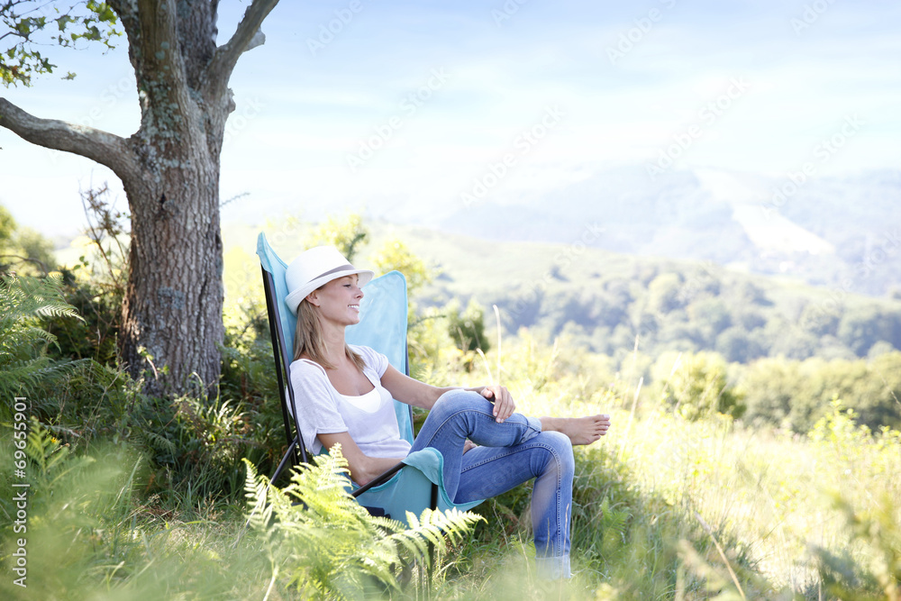 Young woman enjoying peaceful time in countryside Young woman enjoying peaceful time in countryside