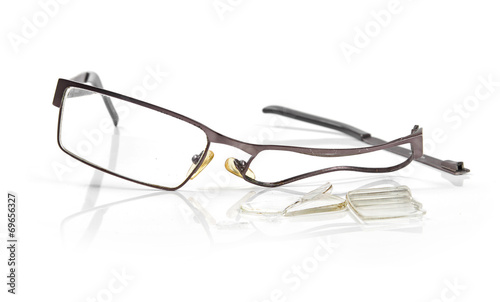 broken eyeglasses isolated on white
