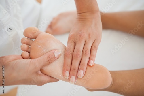 Woman receiving a foot massage © WavebreakMediaMicro