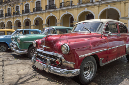 A series of old american cars from the 50's in Havana, Cuba