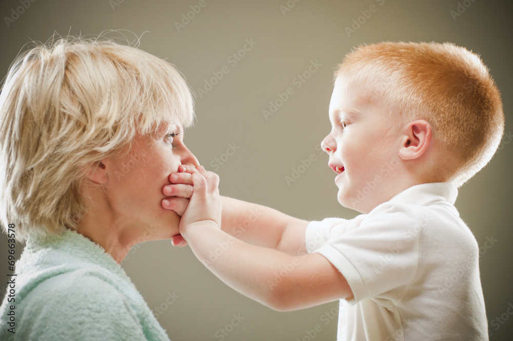 mom and son. emotional portrait mom and son. emotional portrait