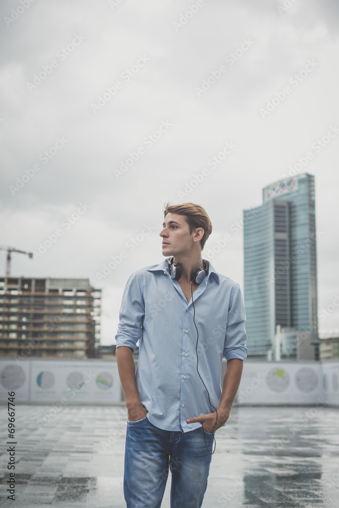 young model hansome blonde man with headphones young model hansome blonde man with headphones