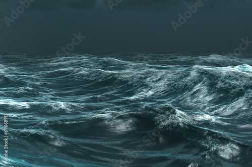 Rough blue ocean under dark sky © WavebreakmediaMicro