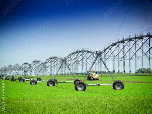 Crop Irrigation using the center pivot sprinkler system photo