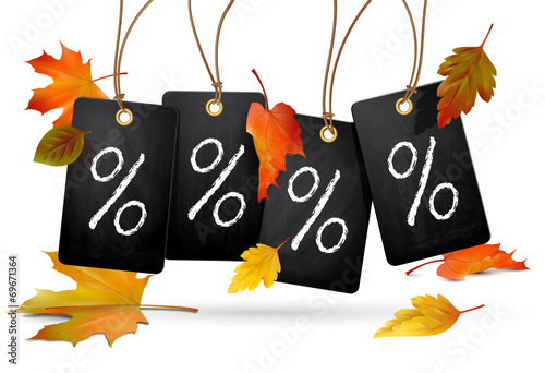 Plaketten mit Prozentzeichen u. Herbstlaub