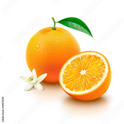 Orange fruit with half and flower on white background